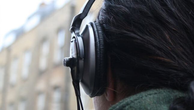 Sound art work - headphones with small microphones mounted on the outside